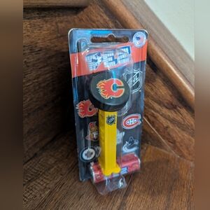 PEZ NHL Puck Dispenser Calgary Flames Team Logo, Room Decor, Gift, Toy